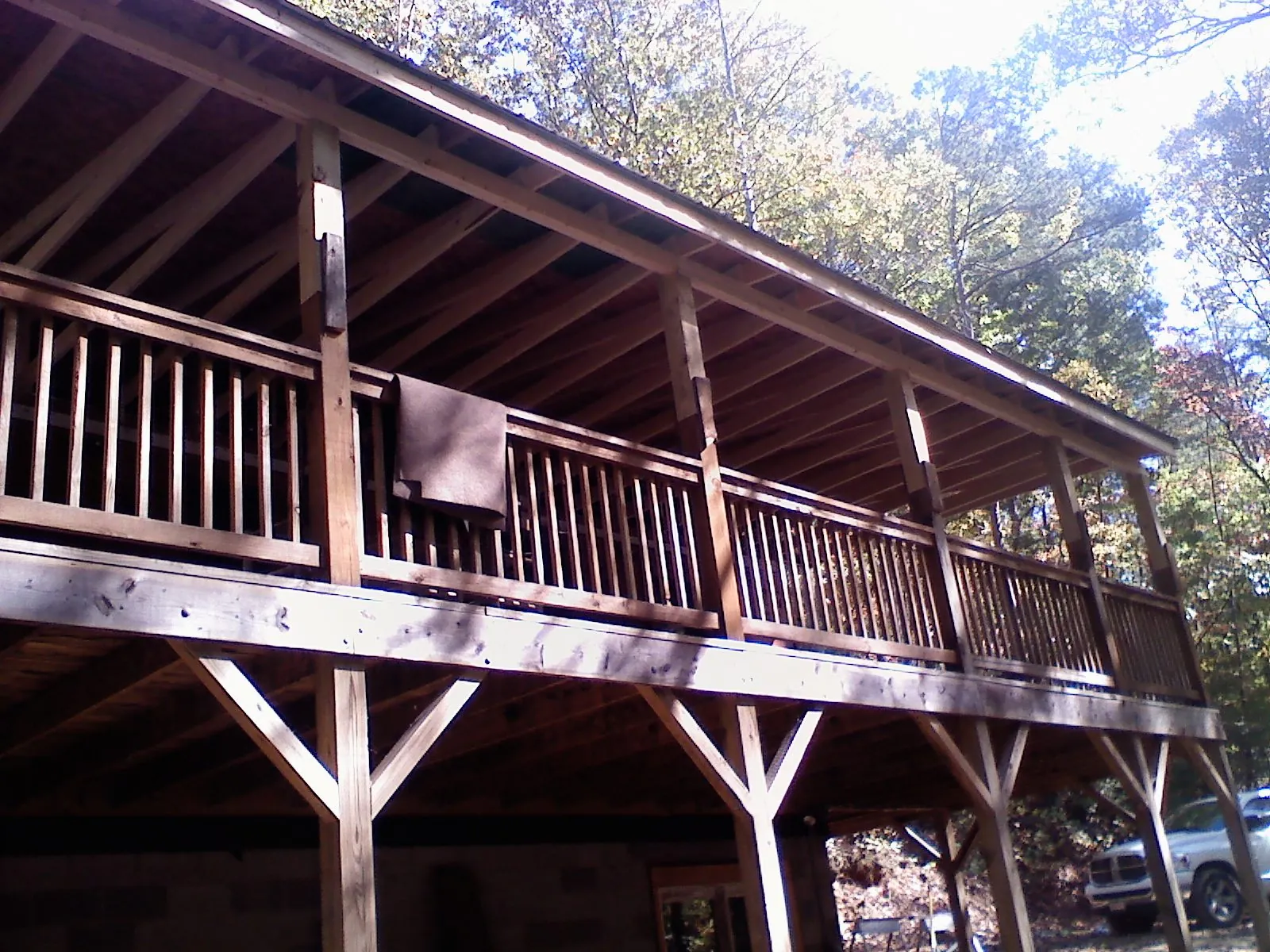 Timber framing under a new elevated porch and deck — Roof Leak Repair in Proctorsville by Roofing Brothers